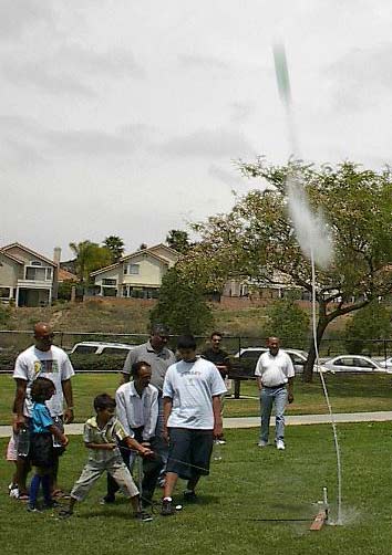A Bottle Rocket leaves the Launch Stand.