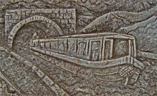 Carving of a Canal Boat.