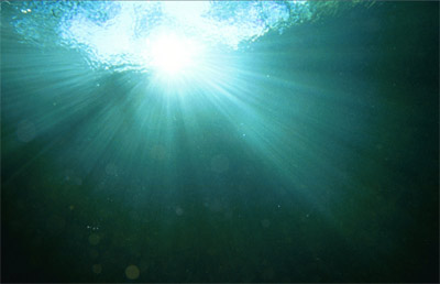 The Sun Bursts through the skylight at Devil's Den.